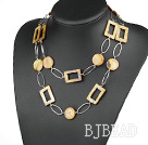 fashion long style party jewelry brown shell necklace with big matel loops