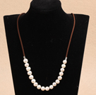 Simple Design White Screw Freshwater Pearl Necklace with Brown Cord under $ 40