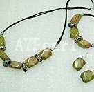 green piebald stone sets
