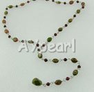green piebald stone and garnet y necklace