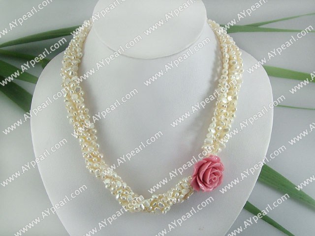 clutred pearl necklace” width=