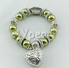 green acrylic pearl tibet silver stretch bracelet under $ 40