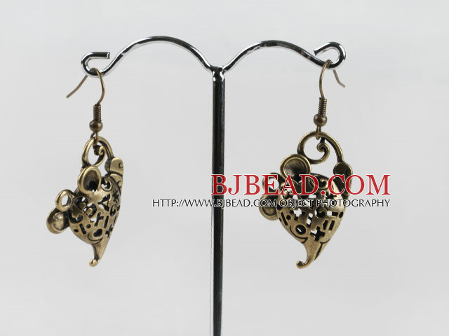 lovely copper earrings with letters engraved