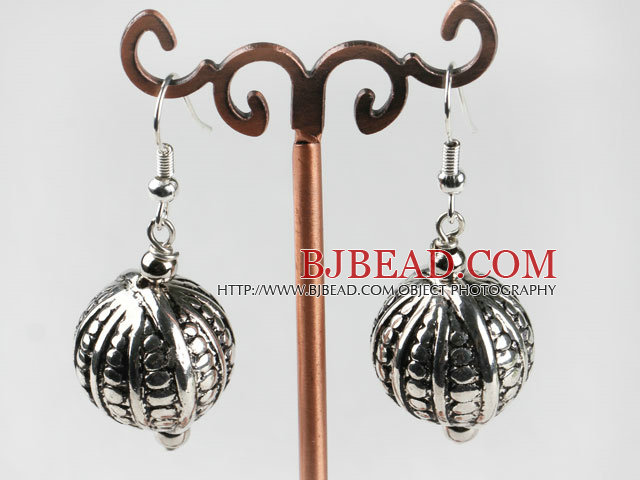 CCB silver like ball earrings with engraved print