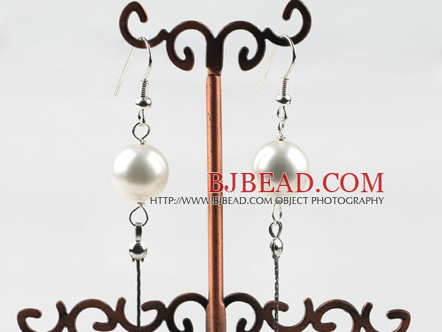 Dangle style white round seashell earrings with long tail