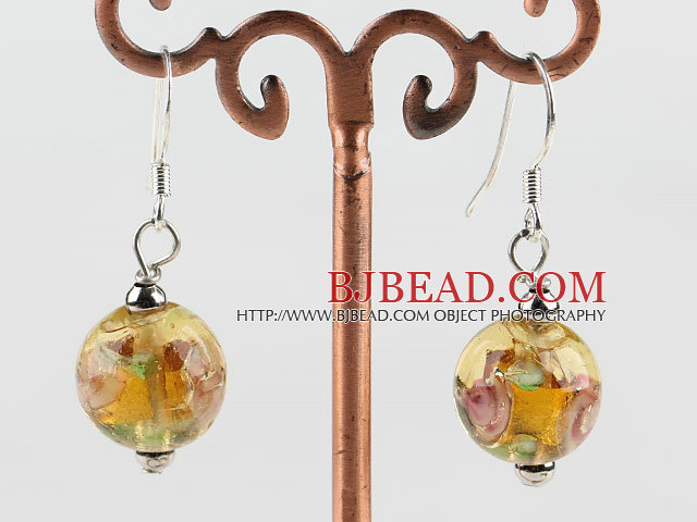 lovely ball shape yellow colored glaze earrings