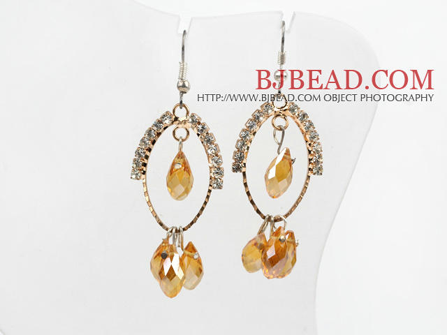 lovely yellow crystal earrings on gold tone loop with rhinestone