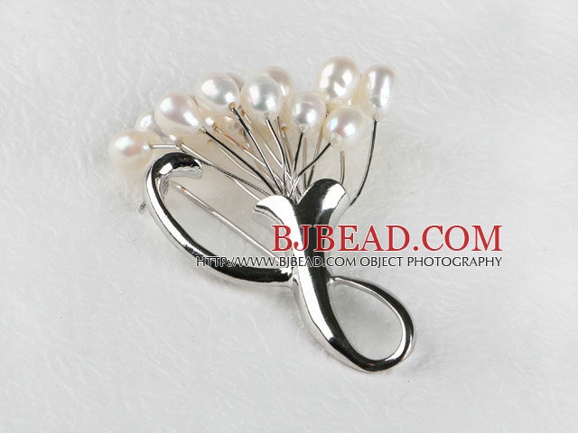 admirably rice shape white  color 5-6mm pearl brooch