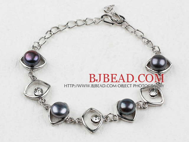 Fashion Style Black Freshwater Pearl Horse Eye Shape Metal Bracelet with Adjustable Chain