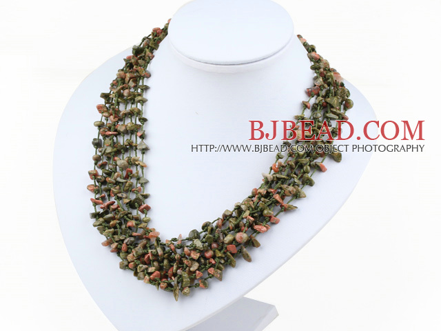 multi strand green piebald stone neckalce with shell flower clasp