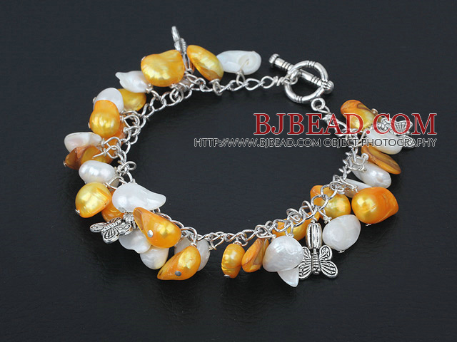 gold and white pearl bracelet with toggle clasp