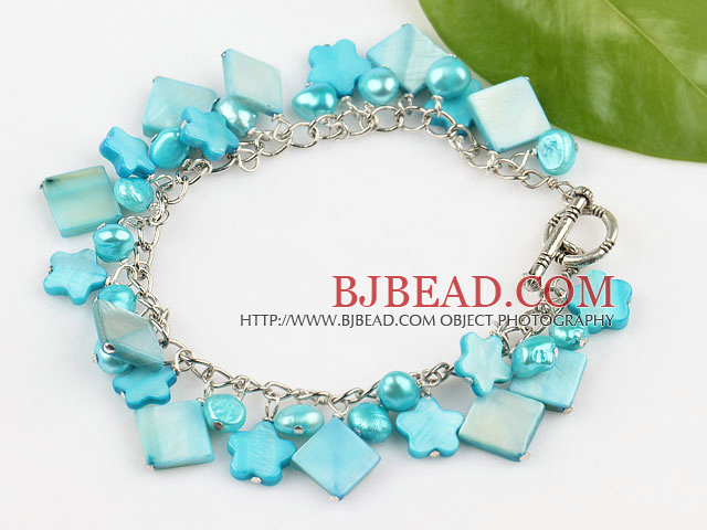 dyed blue pearl and shell bracelet with togglke clasp