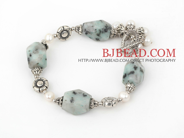 white pearl and spot stone bracelet with toggle clasp