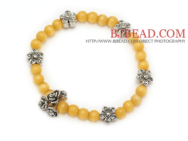 beautiful yellow round cats eye and tibet silver flower charm beaded bracelet