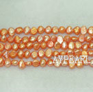 Freshwater pearl beads, dyed light orange, 5-6mm potato. Sold per 14-inch strand.